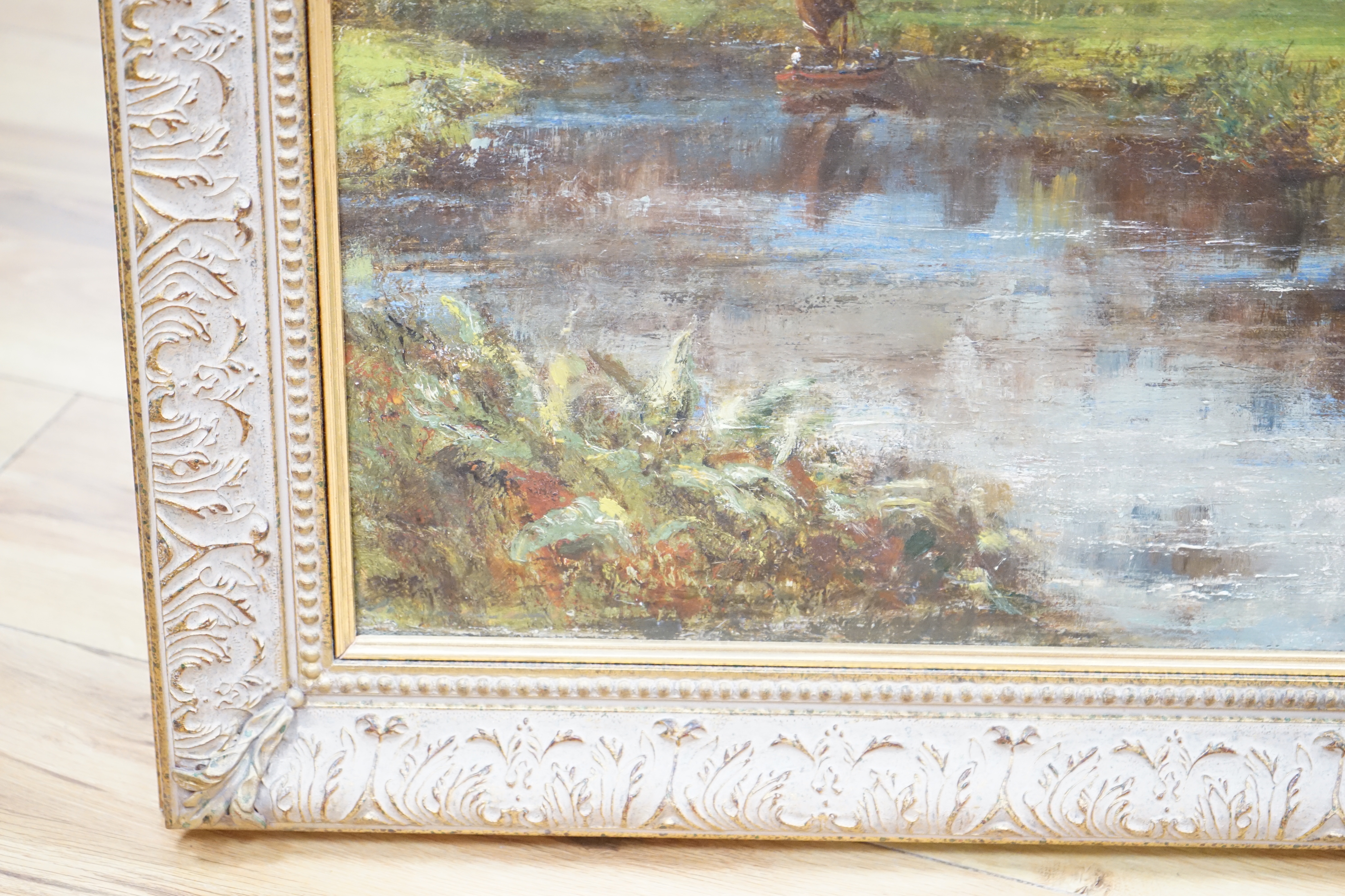 19th century English School, oil on canvas, River scene with cattle, a castle ruin in the background, possibly signed lower left, 110 x 70cm